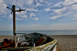 Vintage fishing boat gently resting near a quiet Adriatic shore.