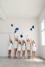 A group of fresh nursing graduates celebrating their job placements.
