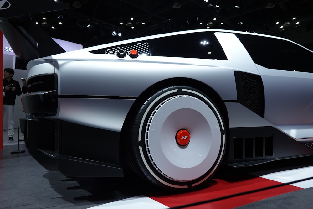 a futuristic car on display at a car show