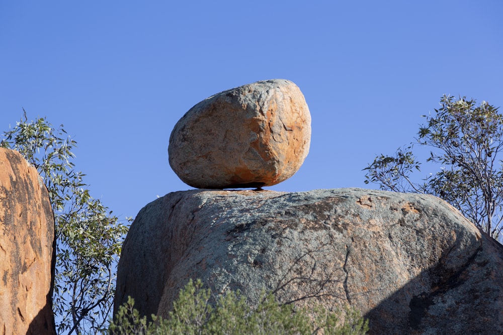 a rock balanced on top of another rock