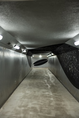 Freshly painted commercial hallway with crack-free walls and smooth finish.