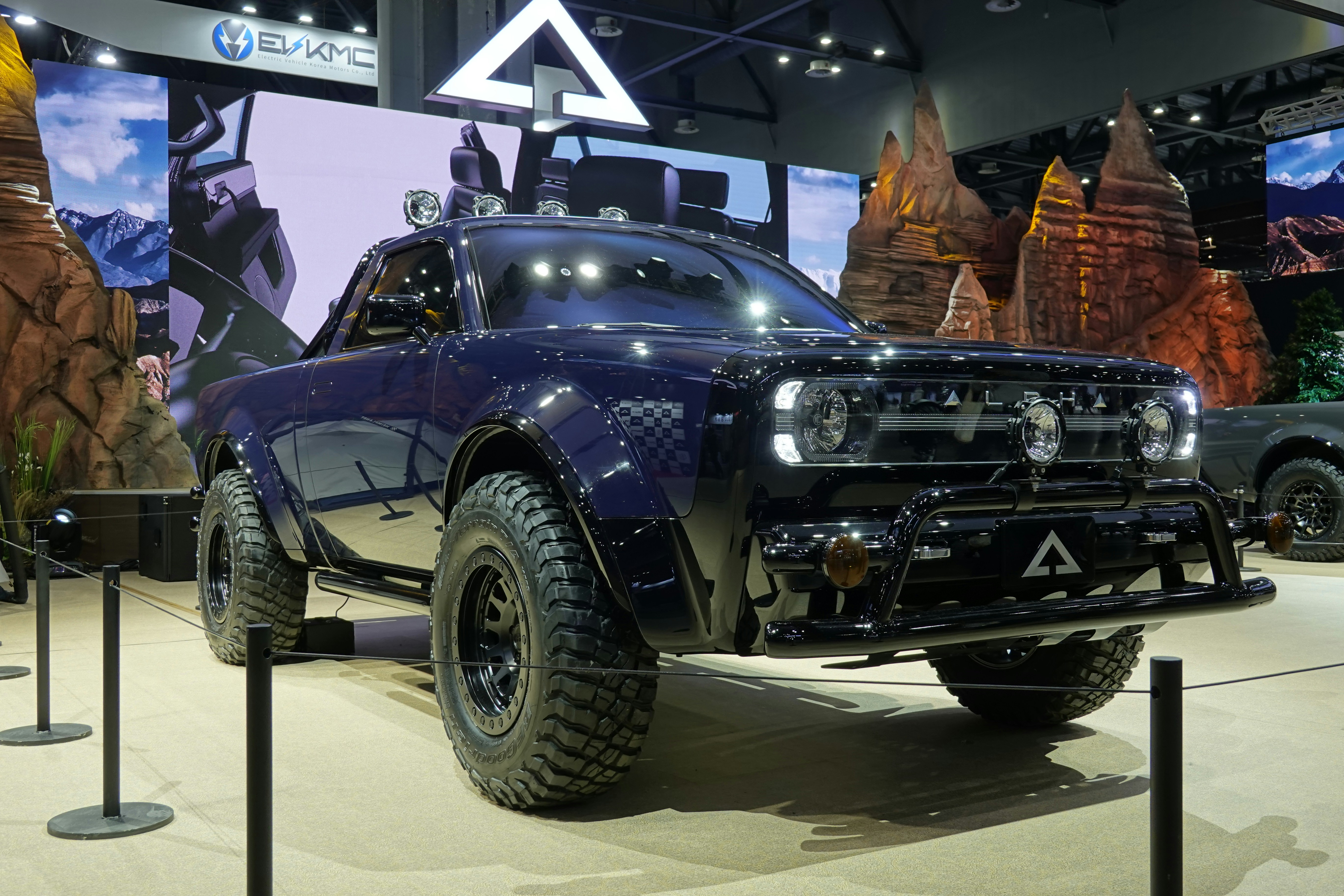 a truck is on display at a car show