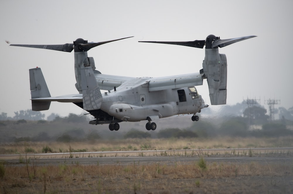 a large air plane taking off from a runway