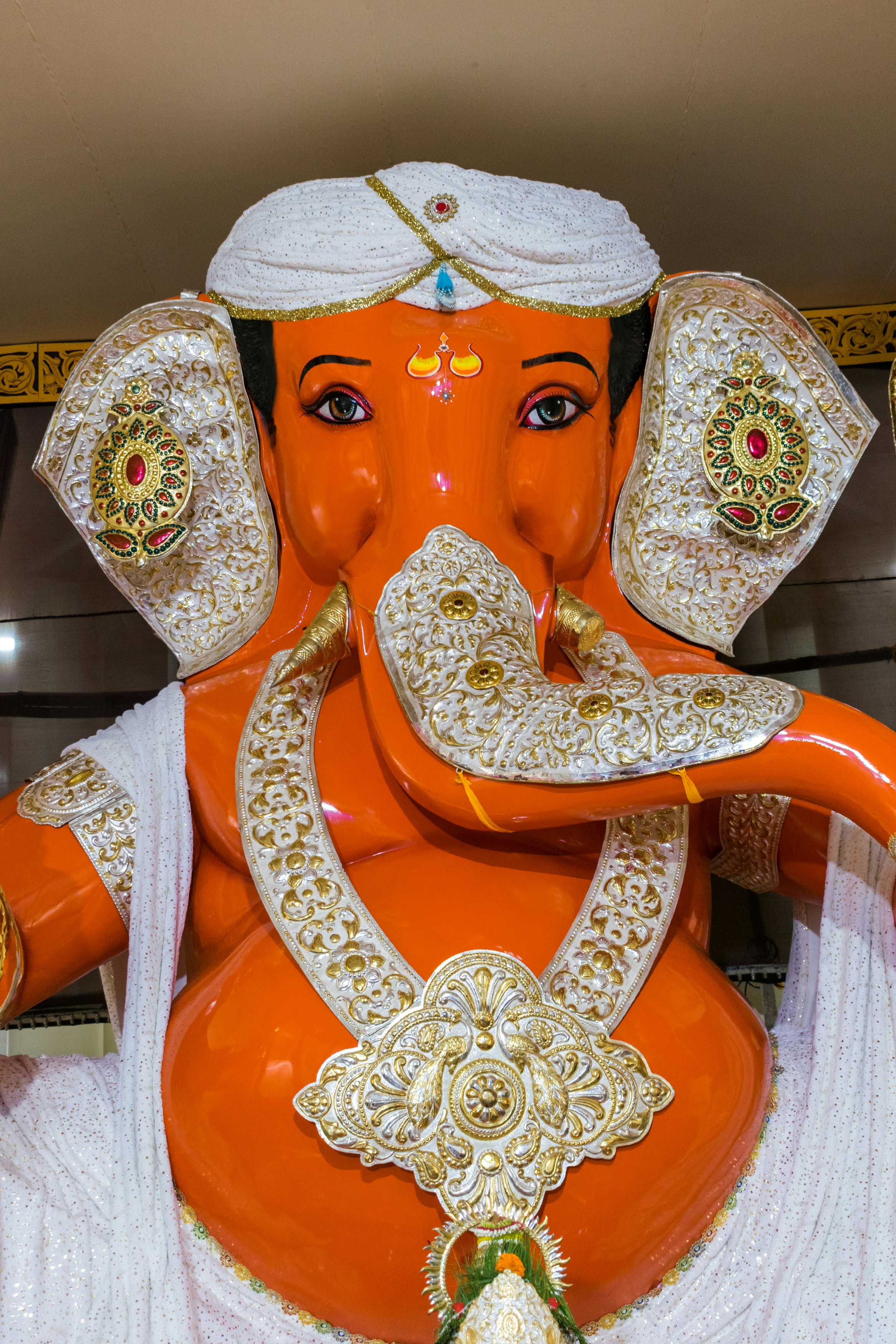 a statue of an elephant wearing a turban