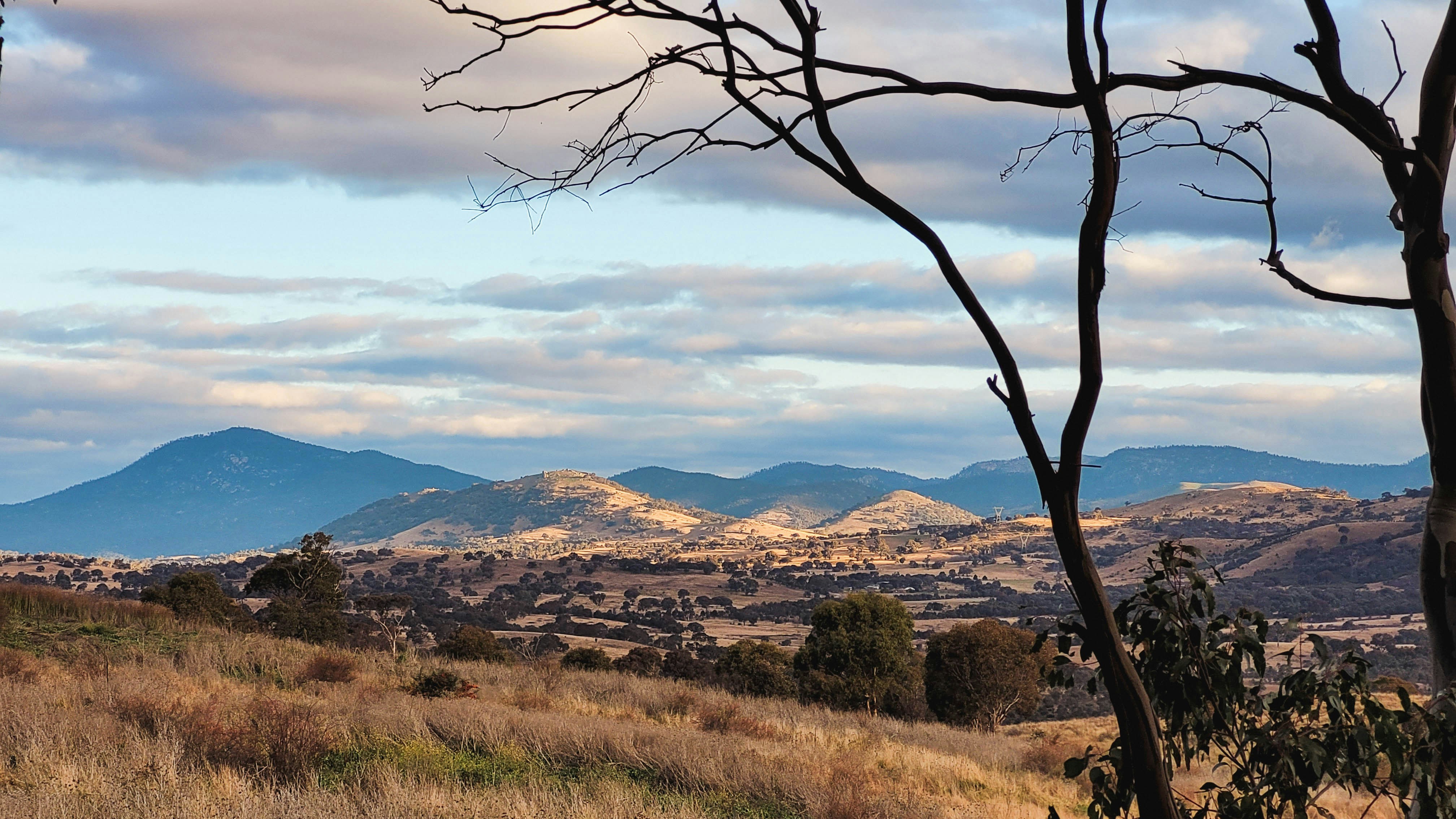 a view of a mountain range from a distance