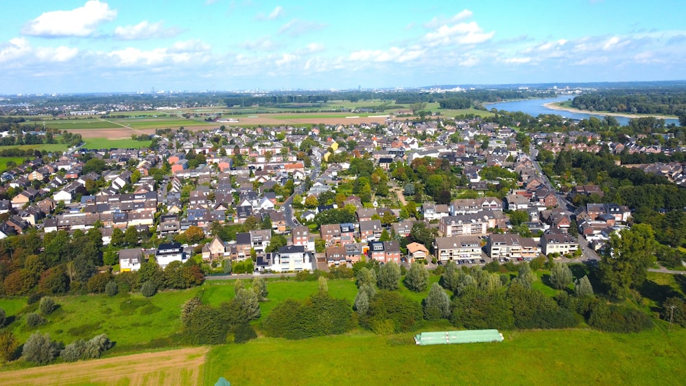 an aerial view of a city with lots of trees