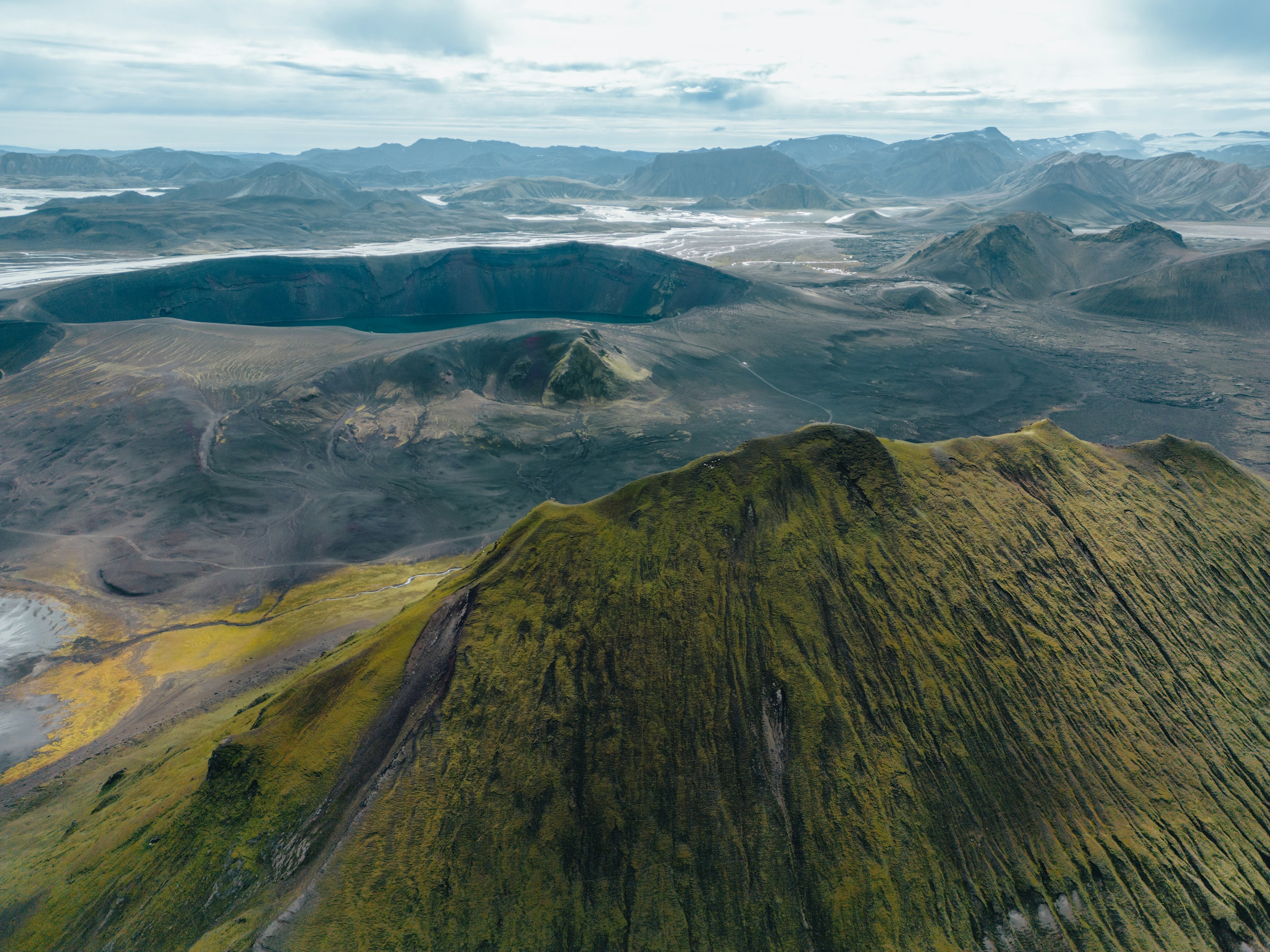 Aerial view of the Iceland Highlands — vast volcanic plateau with sweeping river deltas