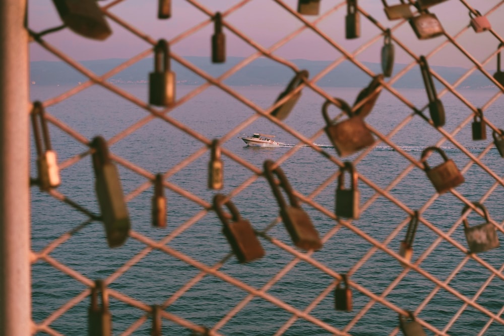 a boat in the water with padlocks attached to it