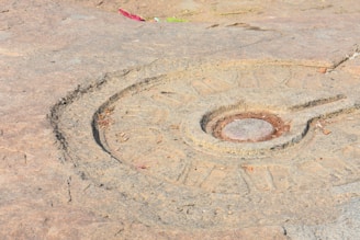Symbolic motifs etched into a medieval artifact, highlighting cultural meanings.