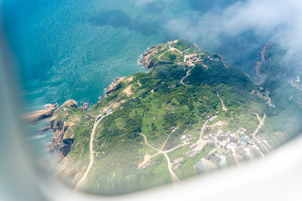 an aerial view of a small island in the ocean