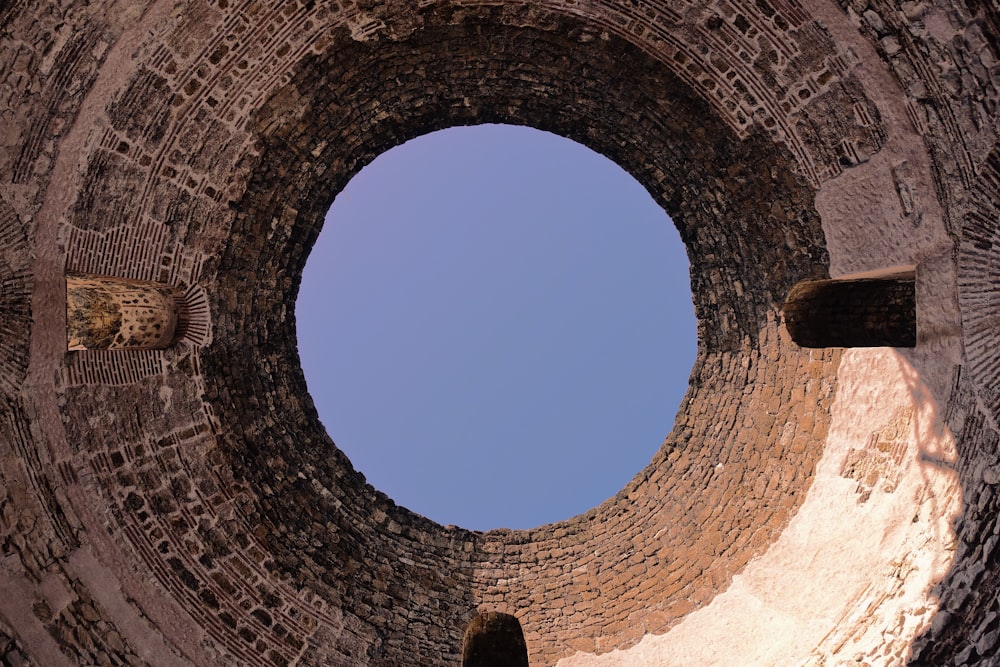 a round hole in the side of a brick building