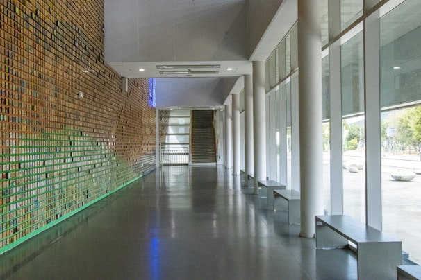 An inviting hallway featuring a seamless tile installation.