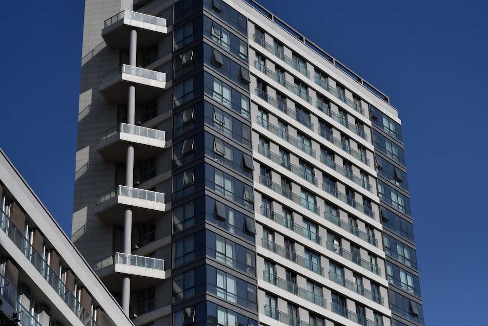 a tall building with balconies and balconies on it