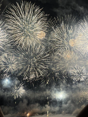 Evening celebration with smoke machine effects and sparkling cold fireworks
