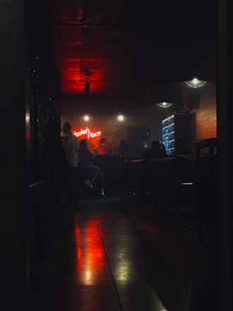 A cozy lounge setting with elegant hookah setups and ambient lighting.