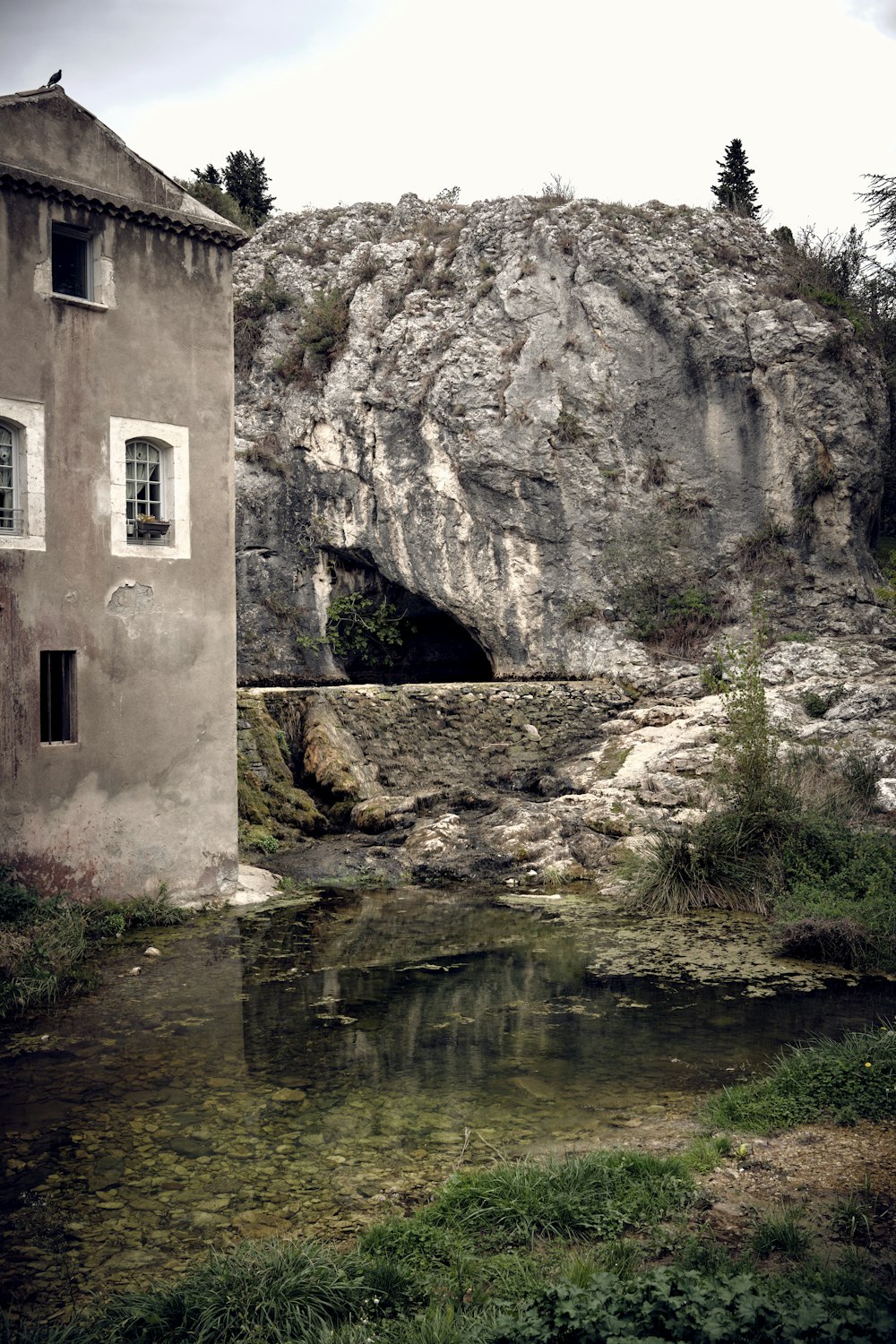 a small river running through a rocky area