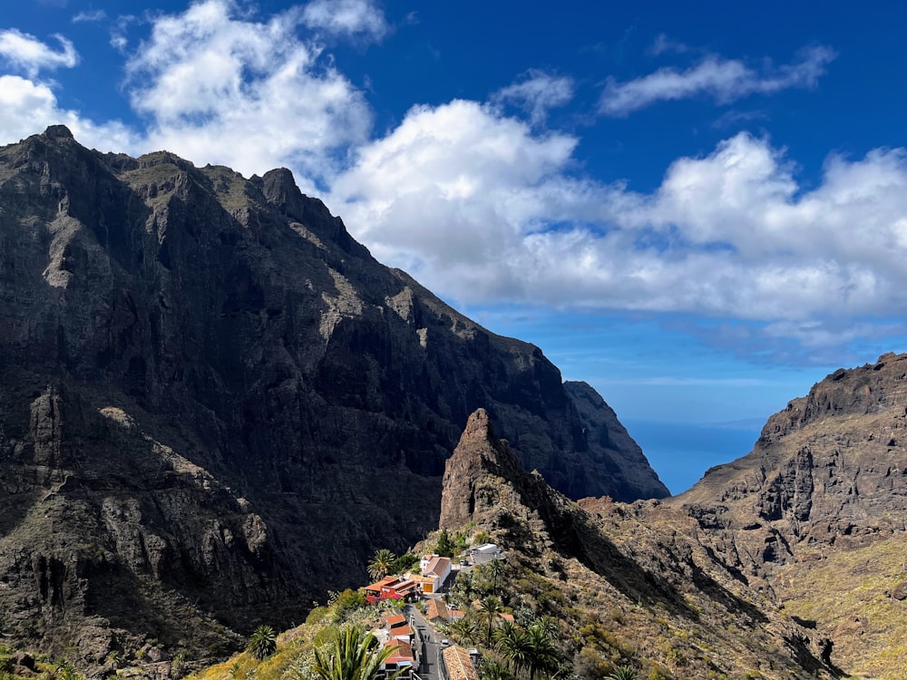 a view of a mountain with a road going through it