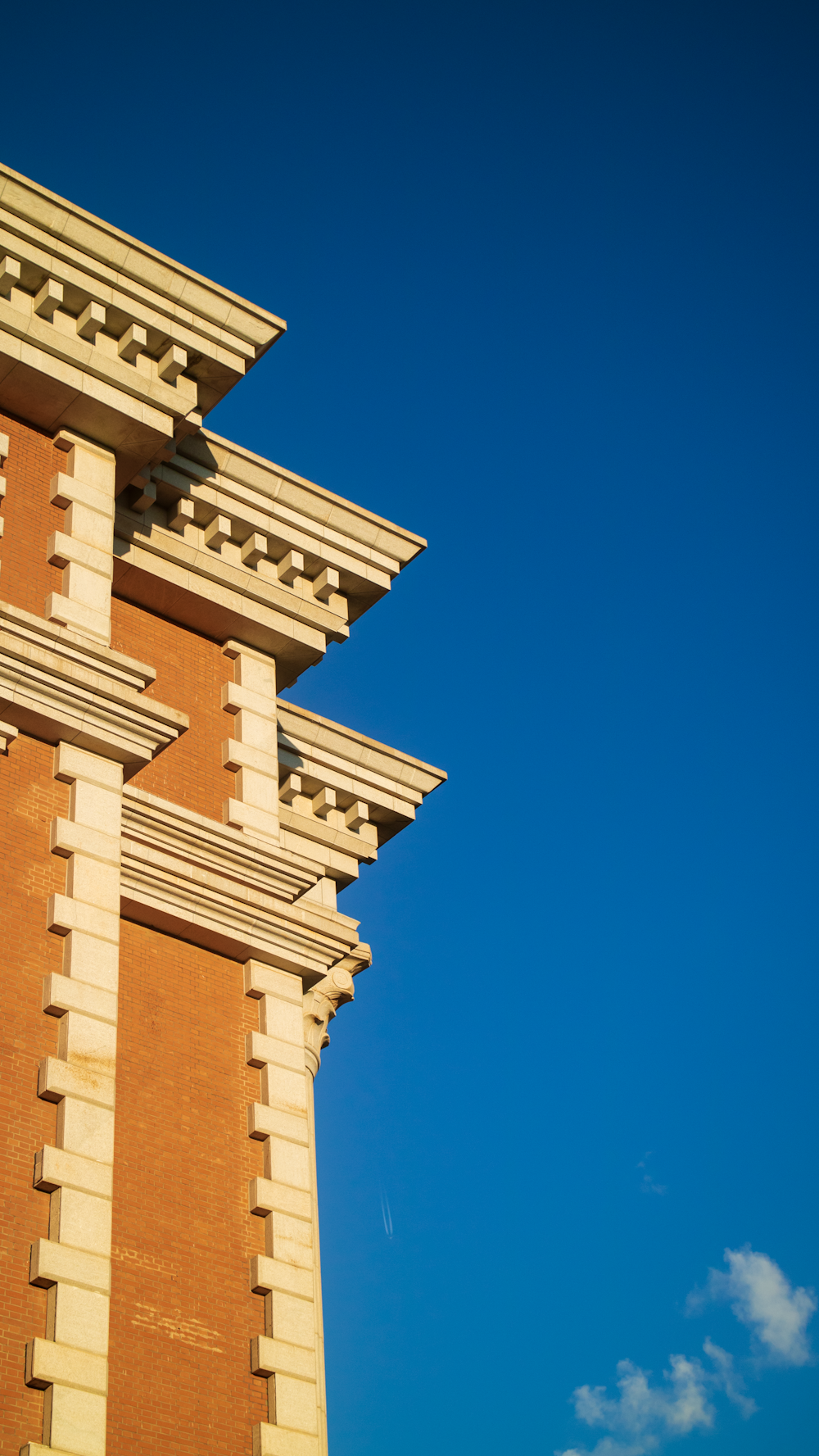 a clock tower with a blue sky in the background