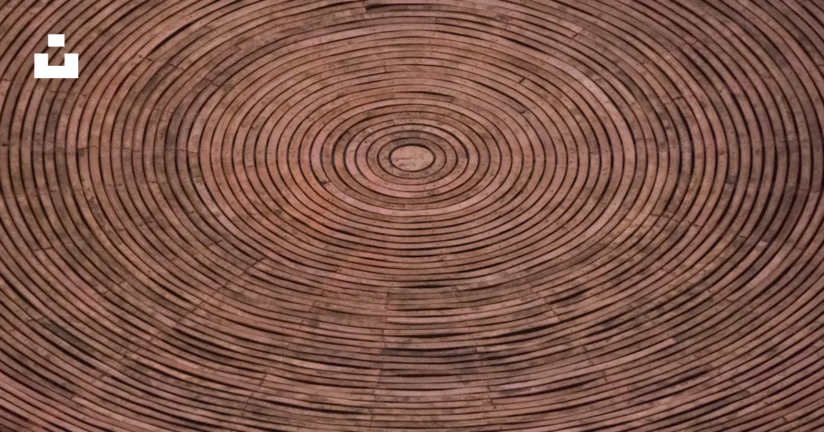A close up of a circular pattern on a wall photo โ Free Architecture ...