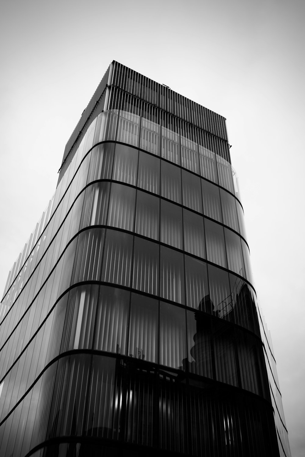 a black and white photo of a tall building