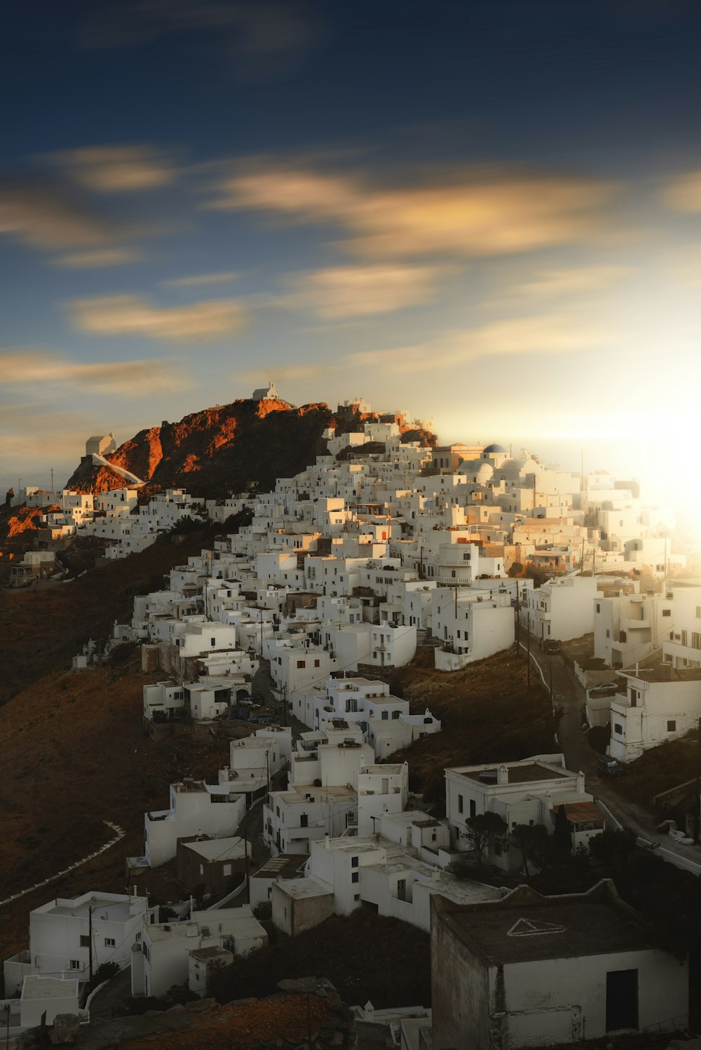 a view of a city with a mountain in the background