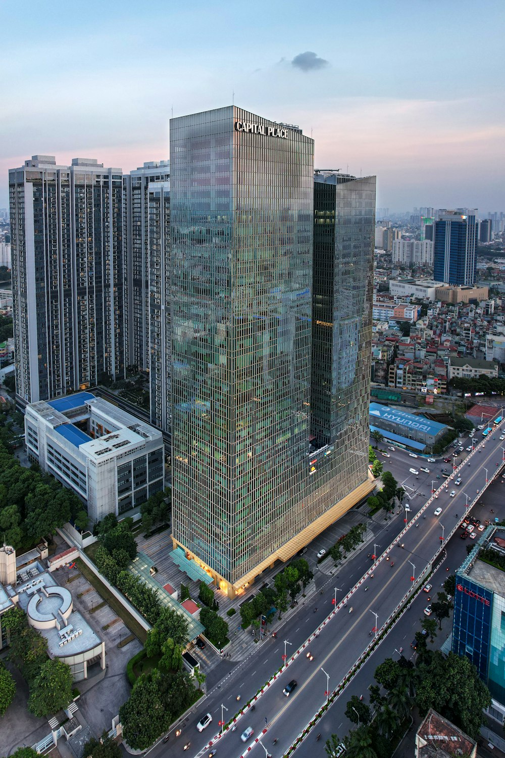 an aerial view of a city with tall buildings