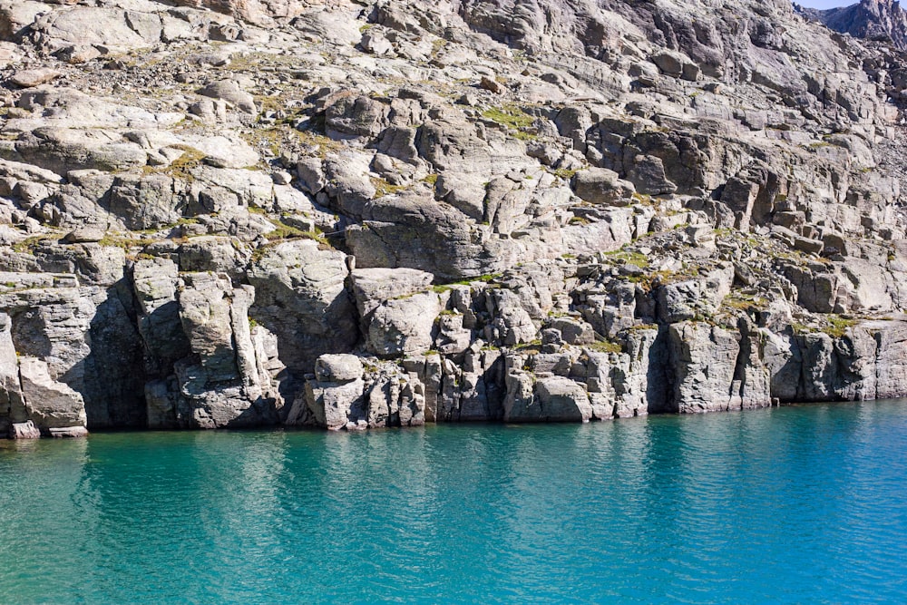 a large body of water surrounded by rocks