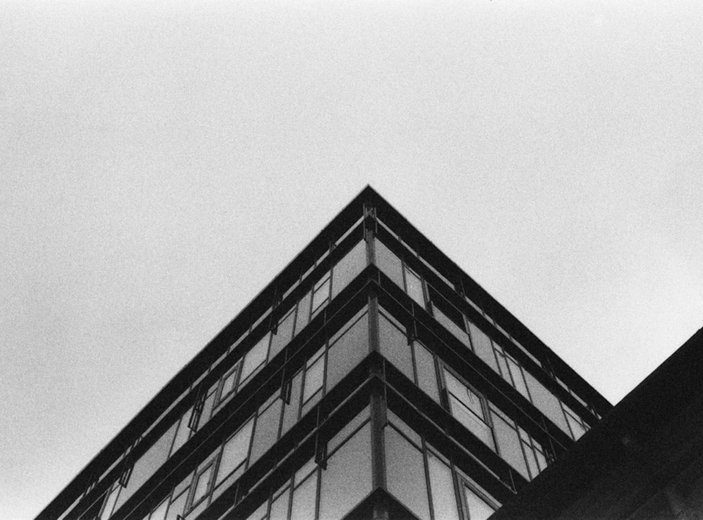 a black and white photo of a tall building