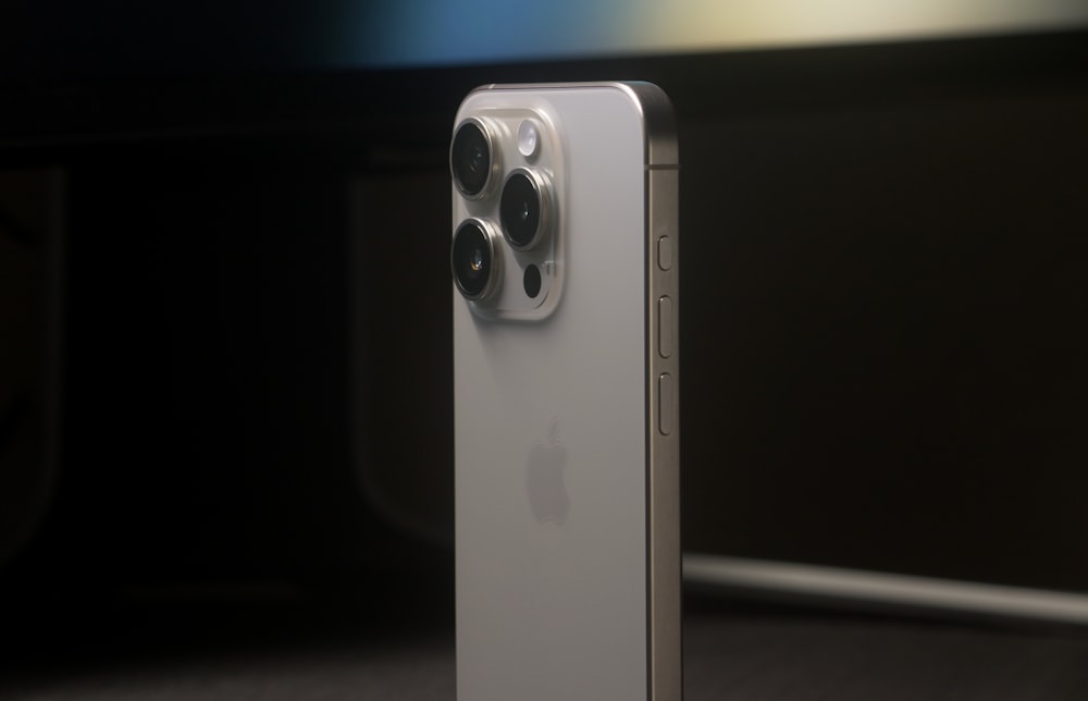 a close up of an apple product with a blurry background