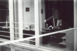 A modern law office interior with bookshelves and a polished desk.