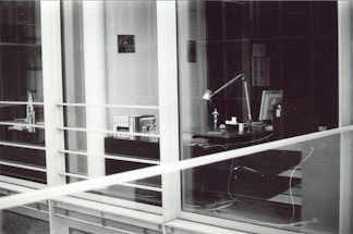 A serene office space with a desk and language books.