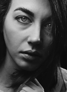 Close-up portrait of a story-driven character with expressive eyes and intricate linework