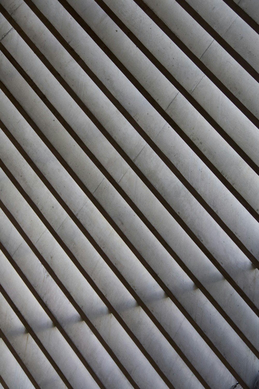 a close up of a metal structure with lines on it