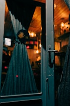 Cozy showroom corner with window curtains and soft lighting