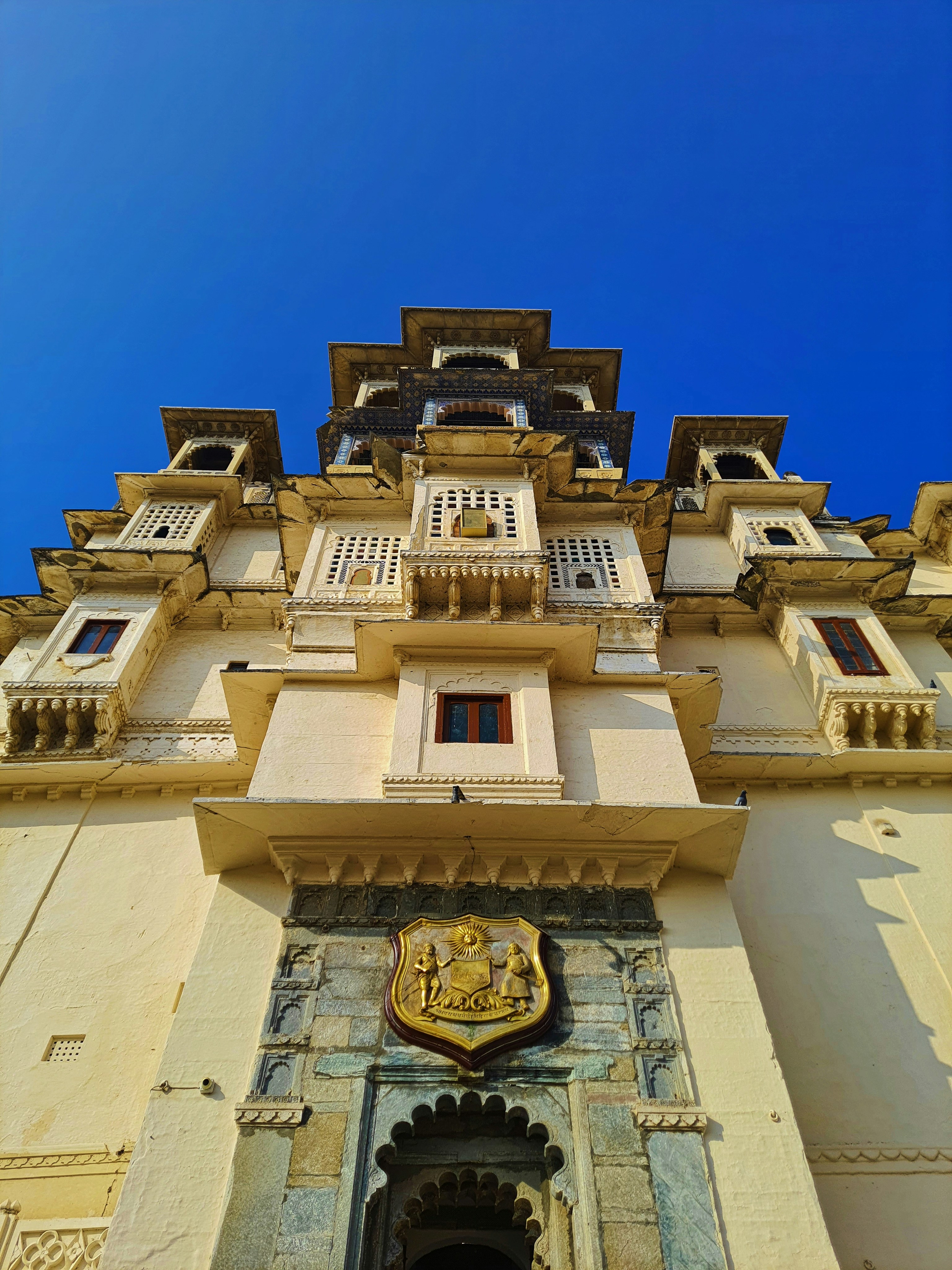 a tall building with a clock on the front of it