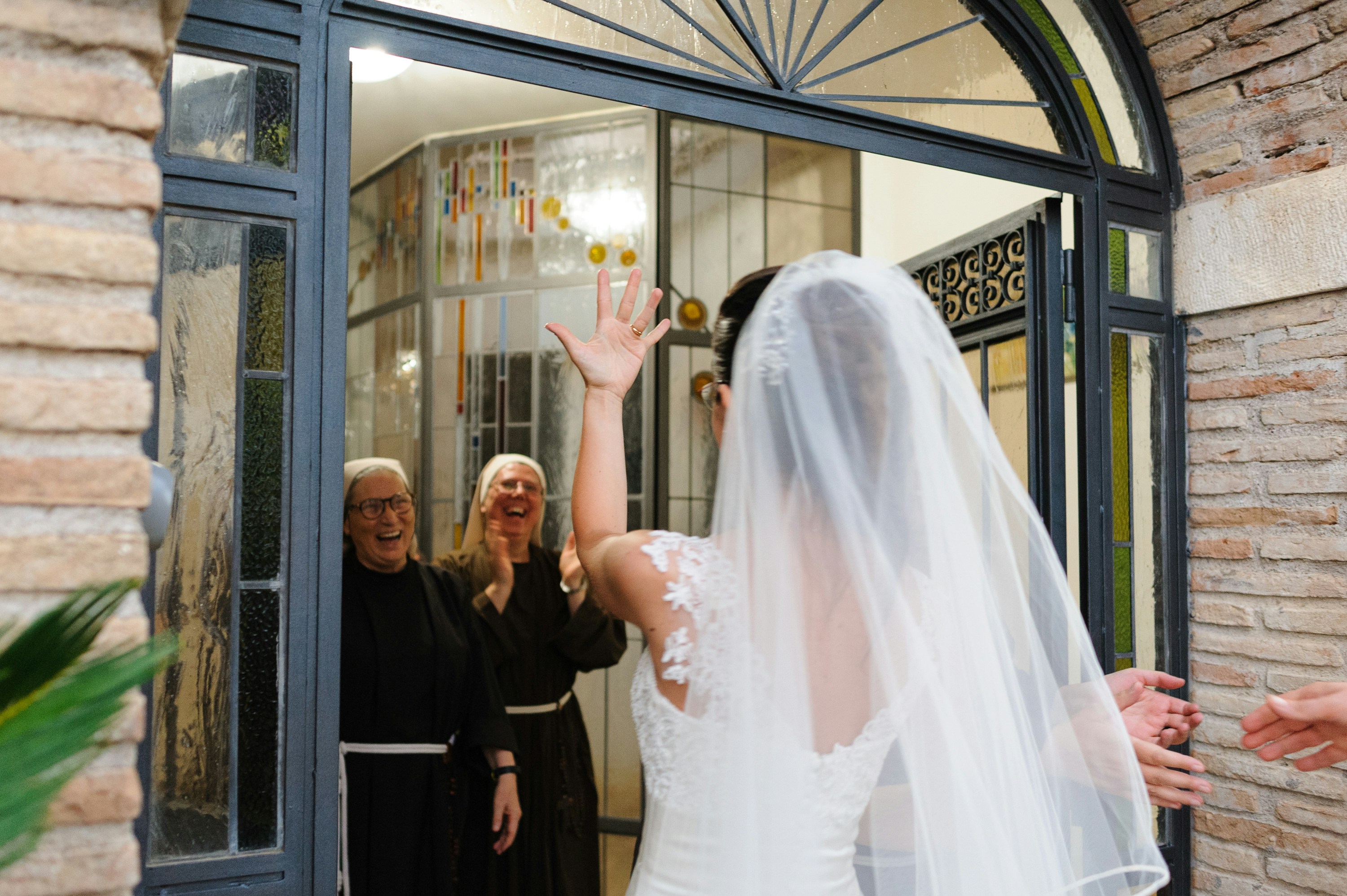 a woman in a wedding dress is getting ready to walk down the aisle