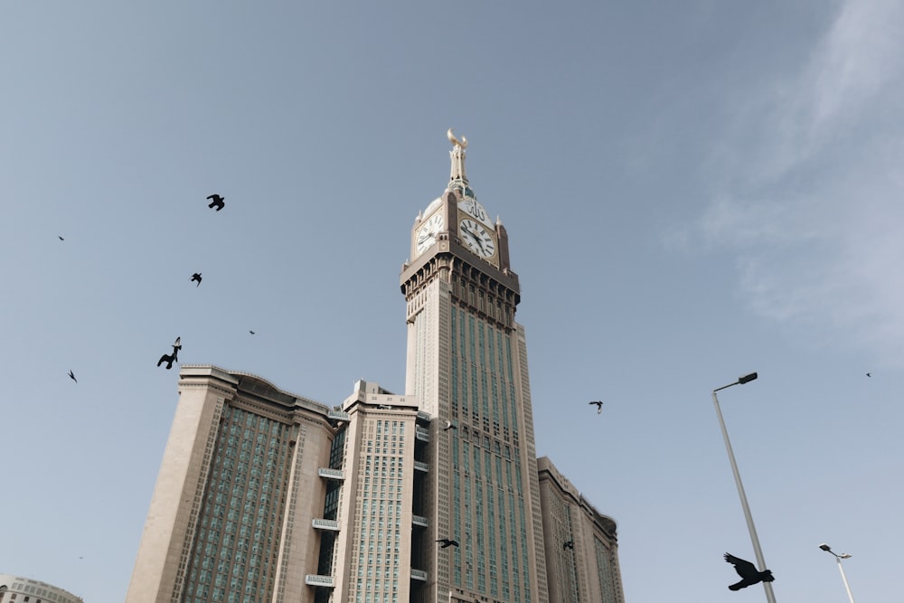 a tall building with a clock on the top of it