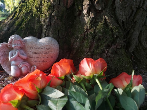 A peaceful corner with flowers and notes left by those who found hope through Saint Jude.