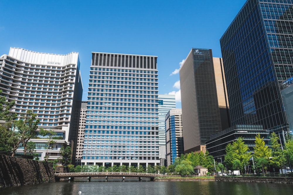 a body of water surrounded by tall buildings