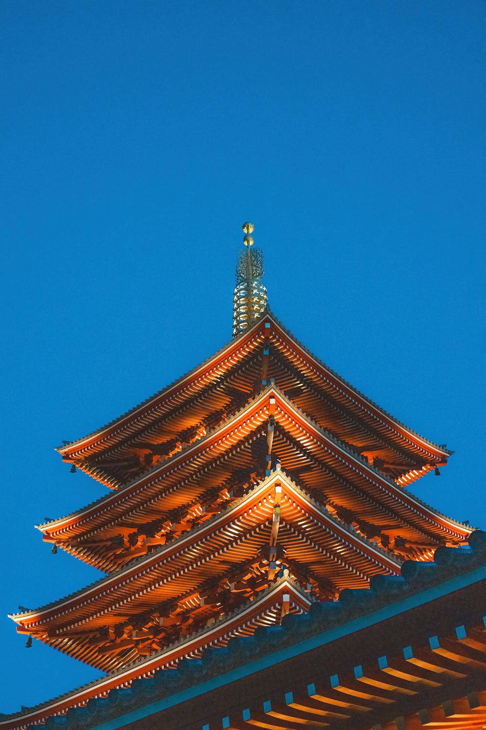 a tall tower with a clock on top of it