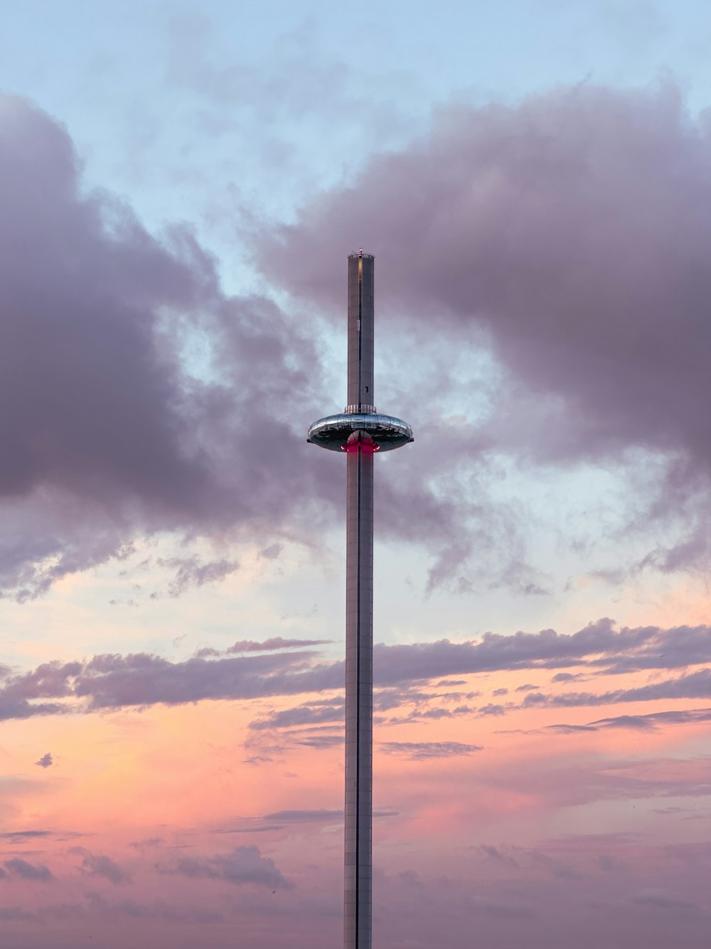 a tall pole with a light on top of it