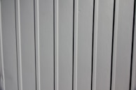 Close-up of a fiberglass panel with a smooth finish, highlighting its quality and texture.