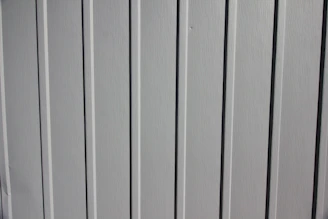 Close-up of a sturdy fiberglass panel with a smooth finish, highlighting its lightweight and durable texture.