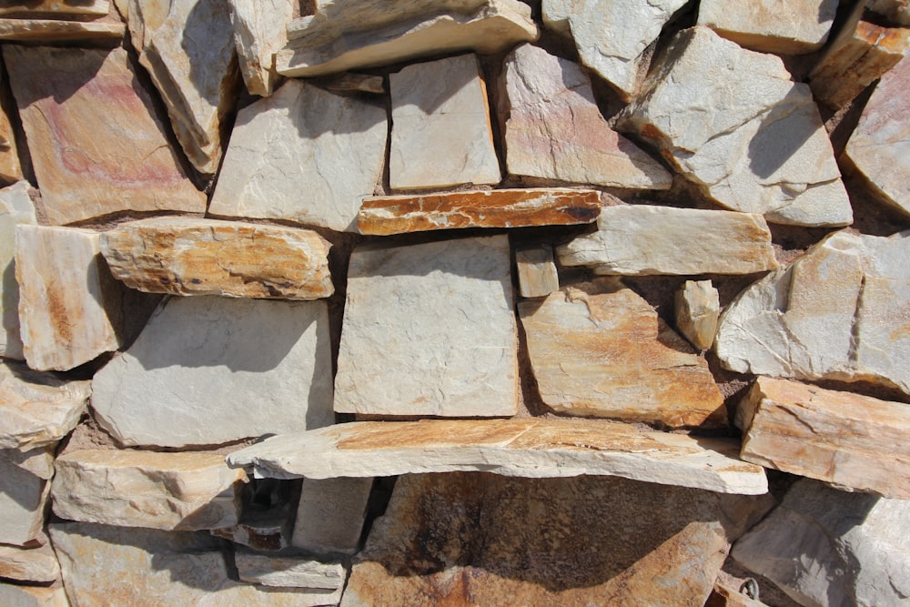 a large pile of rocks sitting next to each other