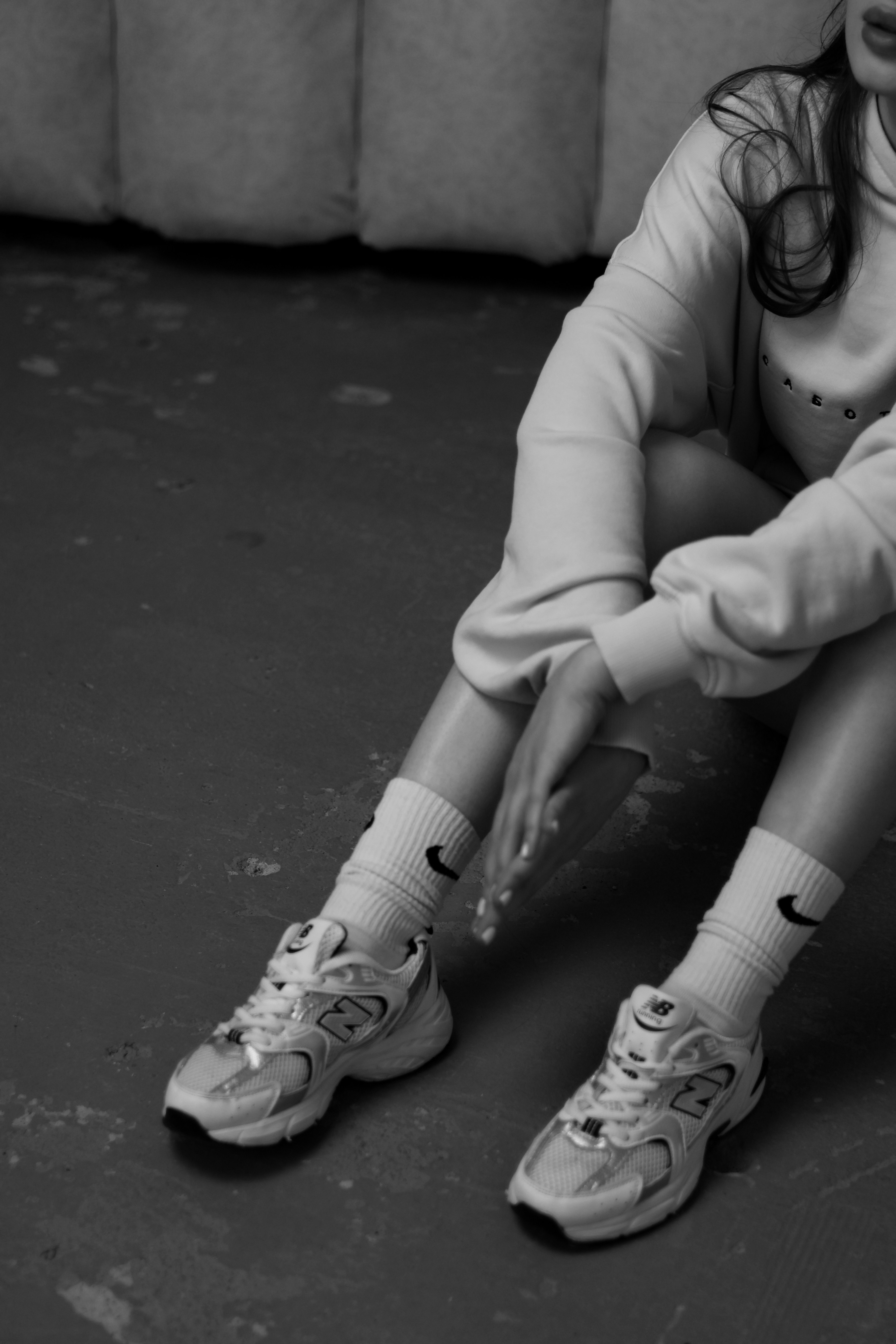 Woman wearing sneakers, urban