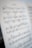 A close-up view of a sheet of musical notation titled 'Fantasie'. The sheet is filled with musical notes, staffs, and annotations written in pencil and ink, suggesting it has been used for studying or practicing music. The background is slightly blurred, drawing focus to the music sheet.