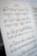 A close-up view of a sheet of musical notation titled 'Fantasie'. The sheet is filled with musical notes, staffs, and annotations written in pencil and ink, suggesting it has been used for studying or practicing music. The background is slightly blurred, drawing focus to the music sheet.
