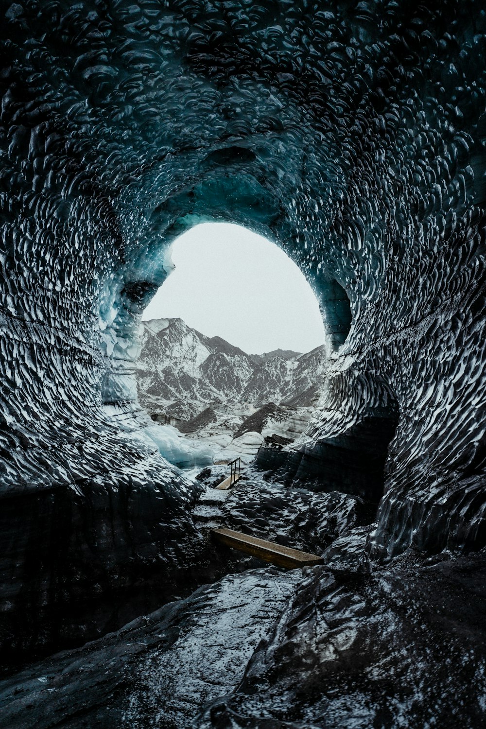 a large ice cave filled with lots of snow