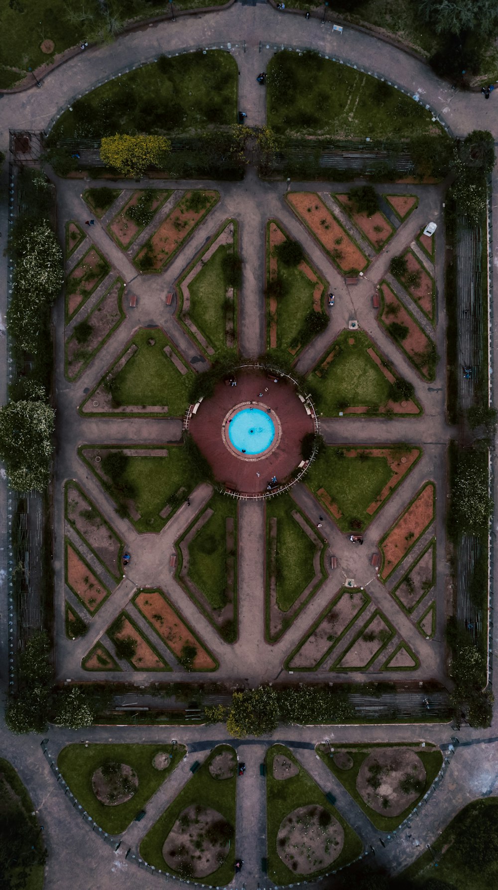 an aerial view of a square in a park