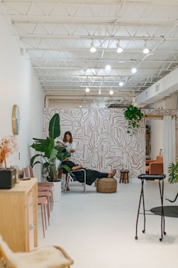 Photo of Marcel and Raquel working together in a modern, minimalist studio space.